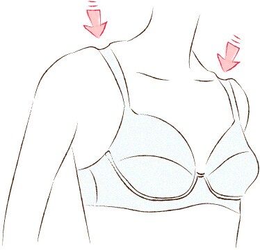ブラのストラップがくいこむ。